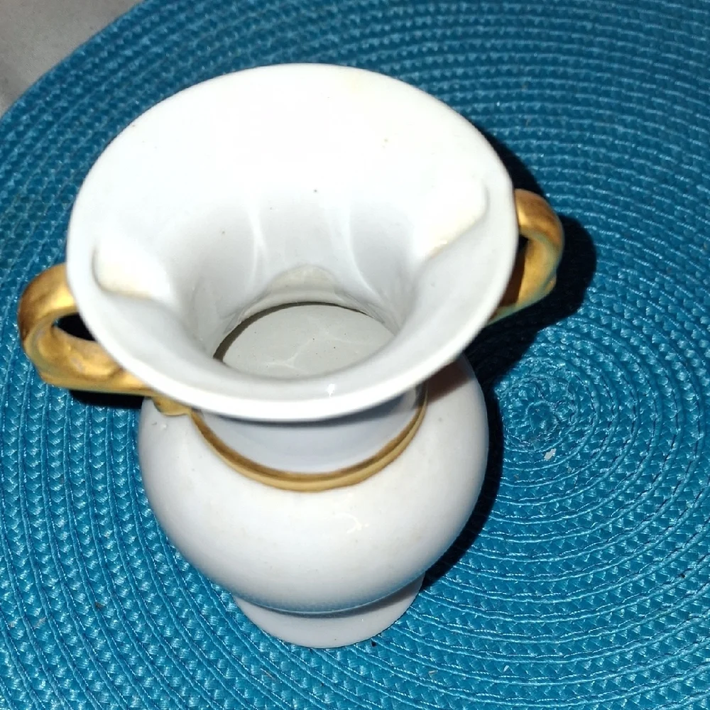 Elegant White Vase with Gold Accents